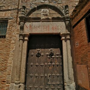 Large wooden entrance door.